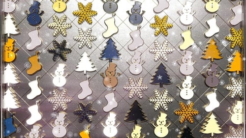 Animated Christmas Icons Grid with Falling Snow and Changing Colors