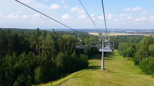 Working Mountain Cableway in Summer Sunny Day