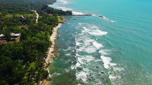 Aerial drone view of Beach and Its Wonderful Sunset View. At anyer beach with noise cloud.