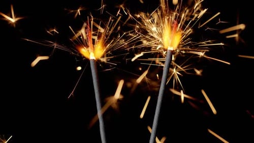 Illuminating Sparklers Against a Black Background