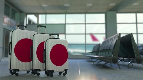Japan Flag Luggage in Airport Travel Scene