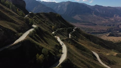 Winding Road Through Rugged Mountain Landscape
