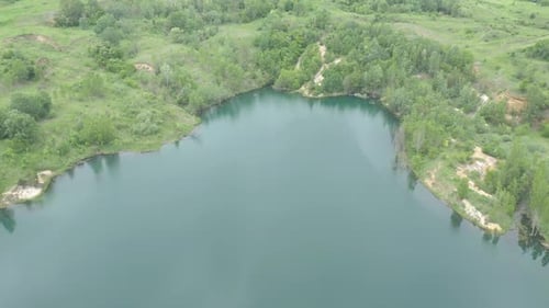 Lake coastal area and blue waters 4K drone video