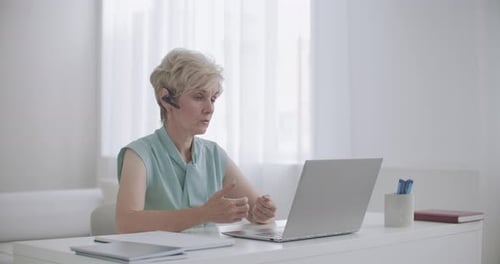 Professional Woman Participating in Online Video Call