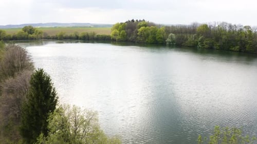 Aerial Drone Shot a Large River in a Rural Area on a Sunny Day Drone Flies Forward