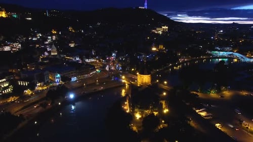 Bright City Lights in Metropolitan Area, Panoramic Drone Footage, Nighttime