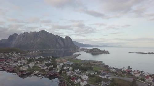 Picturesque view of town by high rocks