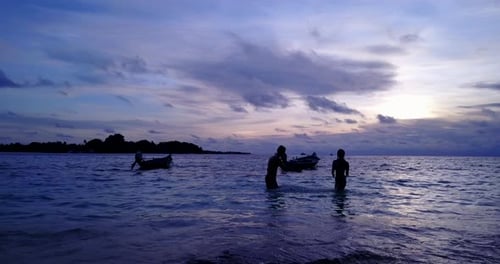Romantic lady and man on romantic honeymoon have fun on beach on sunny white sandy 4K background