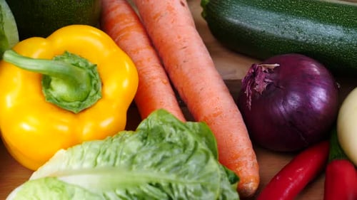 Close Up of Fresh Vegetables on Wooden Surface