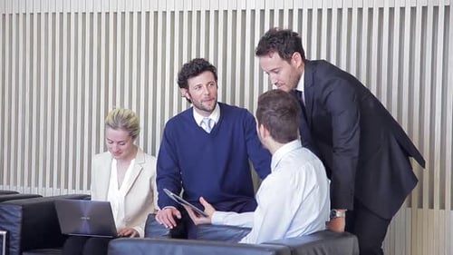 Business Team Discussing Project in Modern Office