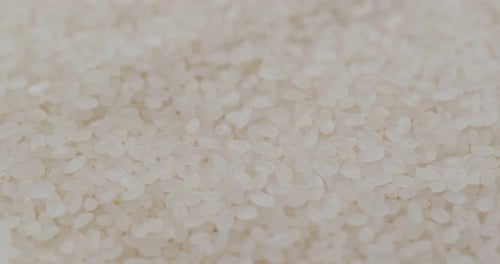 Stack of white rice close up