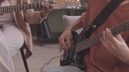 Band Practice Session Indoors with Guitars and Bass