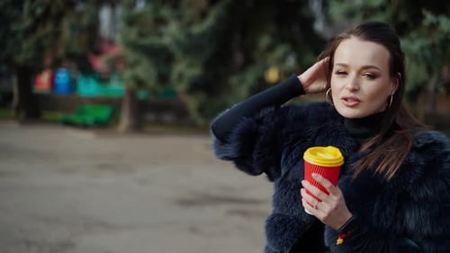 Fashionable girl in the park
