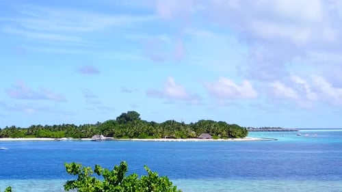 Aerial scenery of marine seashore beach by blue ocean with sand background
