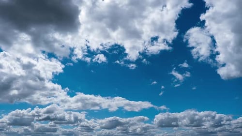 Clouds Flowing Across a Blue Sky