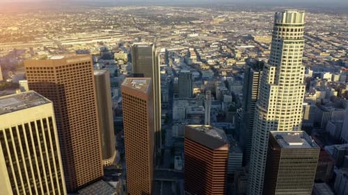 Cinematic urban aerial time lapse of downtown Los Angeles skyline.