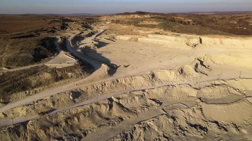 Aerial View of Open Pit Mine of Sandstone Materials for Construction Industry with Excavators and