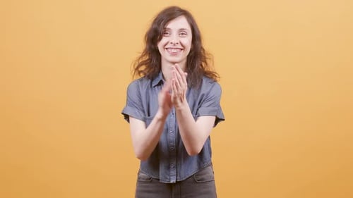 Woman Clapping and Opening Arms to Hug