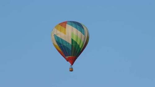 Colorful Hot Air Balloon Floating in Blue Sky
