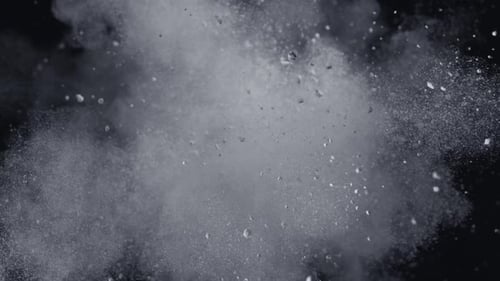 Explosion of White Powder on Black Background