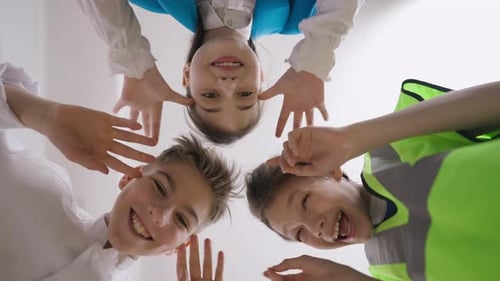 Bottom View Cheerful Friends Siblings Grimacing Making Faces Looking at Camera