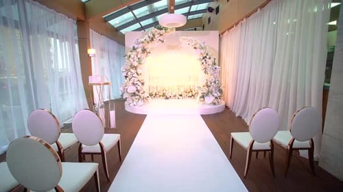 Elegant Wedding Venue with White Floral Arch