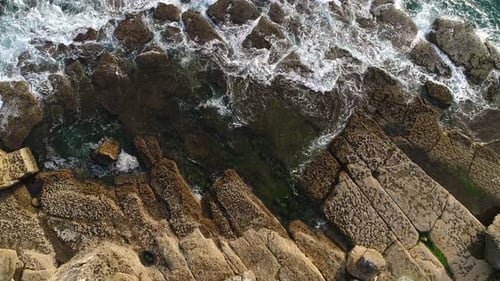 View From Above From the Top of a Cliff with Sharp Peaks to the Seashore