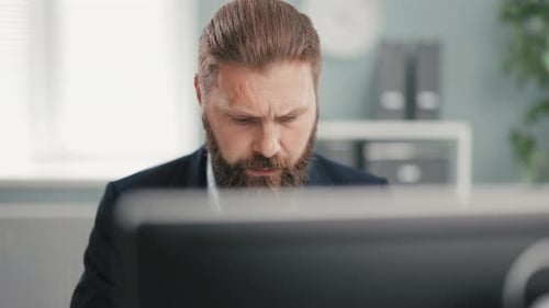 Focused Man Working at Office