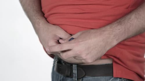 Man Giving Himself an Injection, Close Up