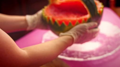 Artfully Carved Watermelon Basket on Table