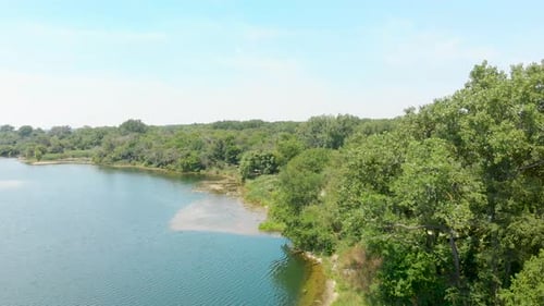 drone aerial decent over lake 4k