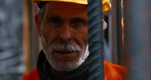Construction Worker with Hard Hat Close Up