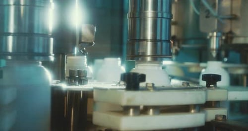 Machines in an automated chemical bottles production line