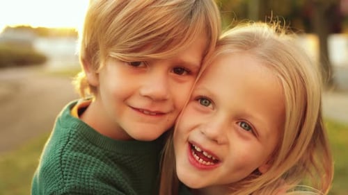 Portrait of Happy Little Brothers Having Fun Outdoor at City Park Family Childhood and Love Concept
