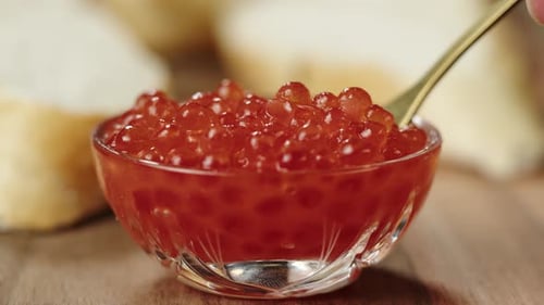 Close Up of Red Caviar in Glass Bowl