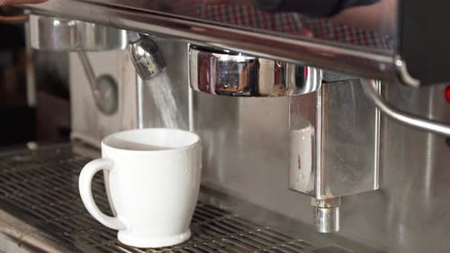 Coffee Machine Dispensing Hot Water into Mug