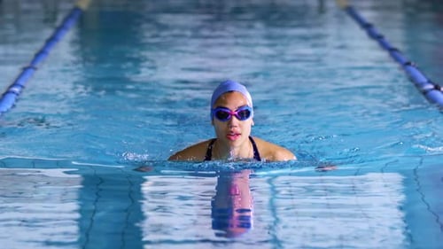Swimmer training in a swimming pool