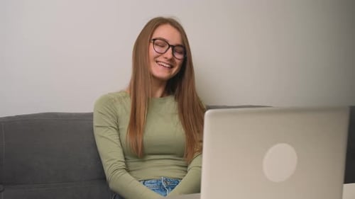 Young Adult Female on Video Call at Home