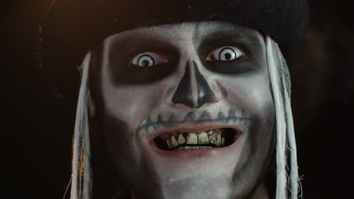 Man with Skeleton Makeup Smiles in Close-up