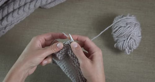 Hands Knitting Gray Wool Garment Close Up