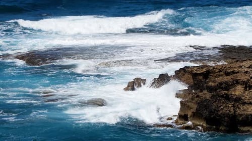 Sea Blue Water and Rocks Sunny Daytime Seascape Devastating and Spectacular Ocean Waves Crash on the