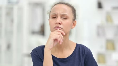 Portrait of African Woman Thinking and Getting Idea