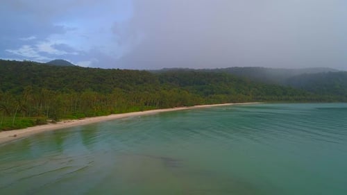 On a Tropical Beach Rain Beginning