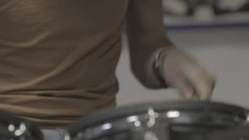 Drummer Playing Music on Drum Set