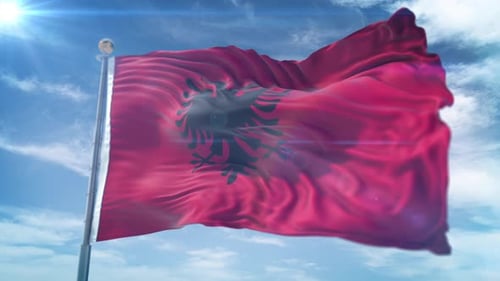Albania National Flag Waving in Wind with Sunny Sky