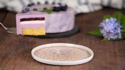 Cake Slice with Fresh Blueberries on a Plate