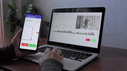 Trader using cryptocurrency exchange for investment on stock market at hedge fund office