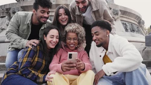 Friends Laughter with Mobile Phone Outdoors