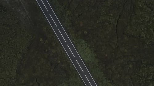Drone Over Empty Icelandic Road In Landscape