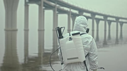 Portrait of Male Scientist at Polluted Seashore